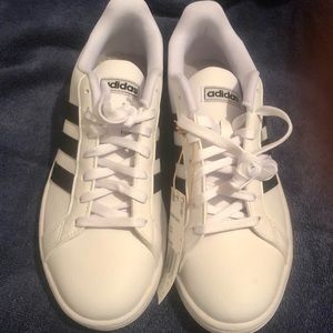 Brand new, never been worn women’s size 8.5 Adidas tennis shoes